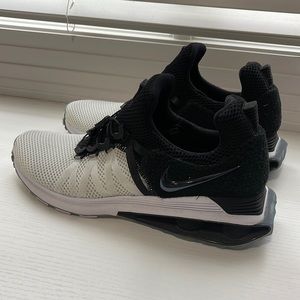 Men's Nike Shox Gravity black and white athletic shoes